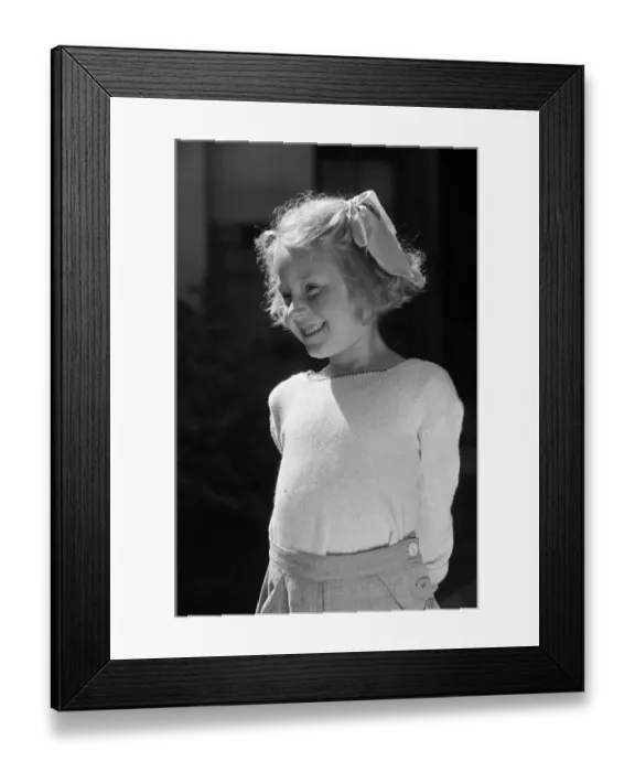 Framed Print : A portrait of a young girl, Ella Edwards. Circa 1942