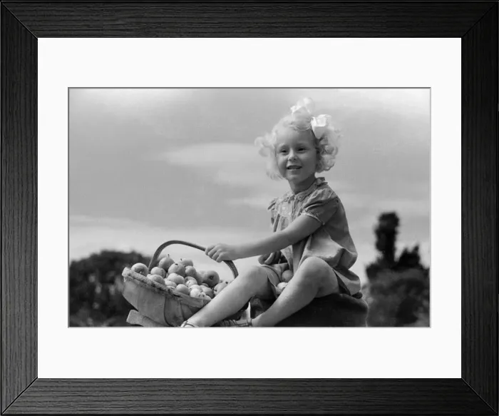 Framed Print : Ella Edwards with a fruit basket. October 1941 Framed Print : Ella Edwards with a fruit basket. October 1941