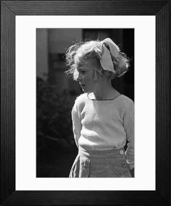 Framed Print : A portrait of a young girl, Ella Edwards. Circa 1942