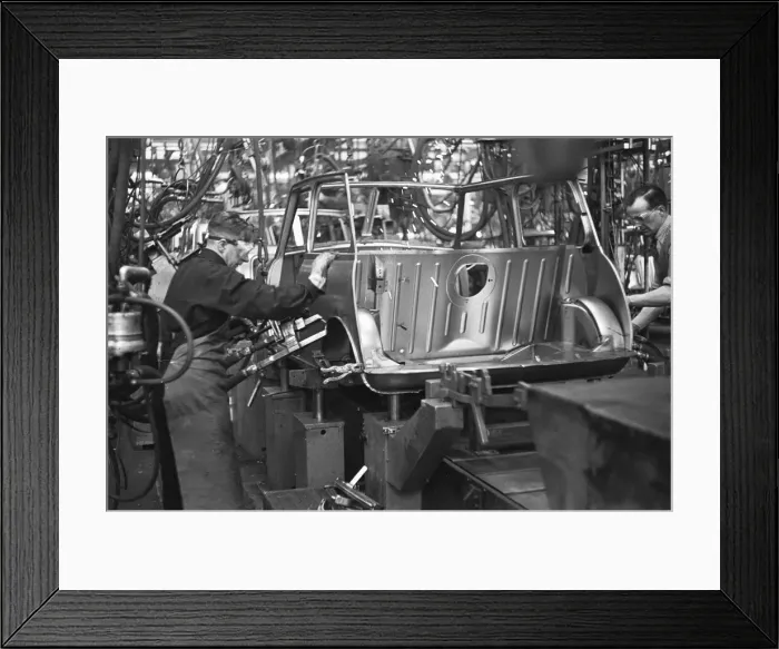 Framed Print : Body panels for the Austin Mini seen here being welded on the production line Framed Print : Body panels for the Austin Mini seen here being welded on the production line