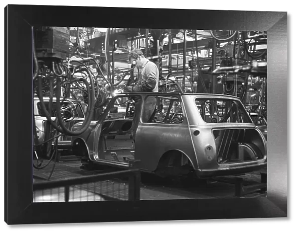 The Austin Mini production line at Longbridge. 10th March 1963 Body panels being spot