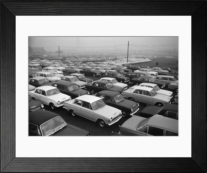 Framed Print : Scenes at the Ford motor factory in Dagenham, Essex showing cars parked outside Framed Print : Scenes at the Ford motor factory in Dagenham, Essex showing cars parked outside