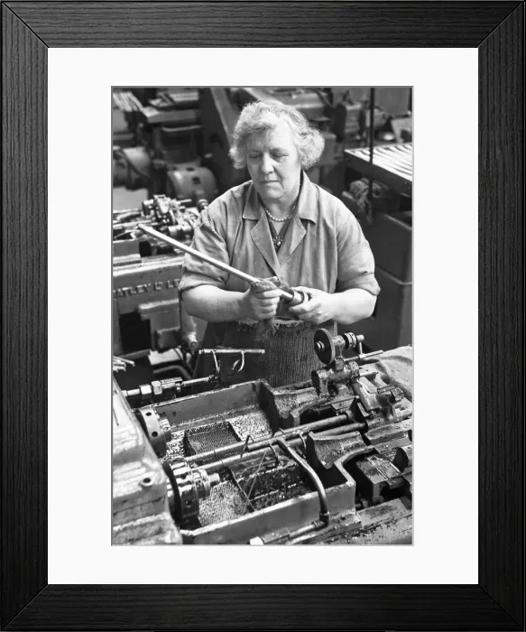 Framed Print : Machinist at the BSA Factory, Small Heath, Birmingham seen here manufacturing front forks Framed Print : Machinist at the BSA Factory, Small Heath, Birmingham seen here manufacturing front forks