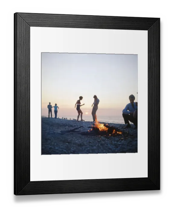 Framed Print : Group of friends enjoying themselves during a day out at the seaside in Greece Framed Print : Group of friends enjoying themselves during a day out at the seaside in Greece