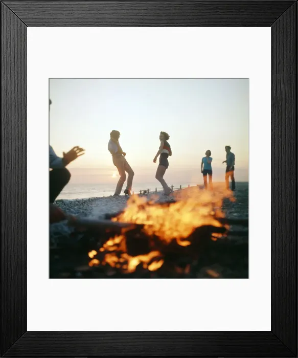 Framed Print : Group of friends enjoying themselves during a day out at the seaside in Greece Framed Print : Group of friends enjoying themselves during a day out at the seaside in Greece