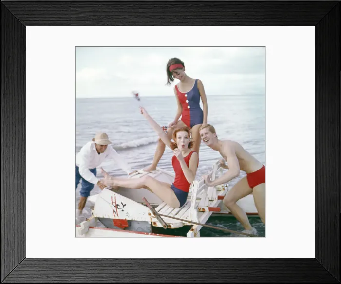 Framed Print : Group of friends enjoying themselves during a day out at the seaside in Greece Framed Print : Group of friends enjoying themselves during a day out at the seaside in Greece
