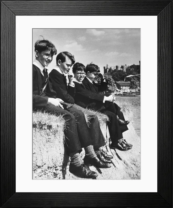 Framed Print : Eton pupils sitting on the edge of a river bank Dbase MSI Framed Print : Eton pupils sitting on the edge of a river bank Dbase MSI