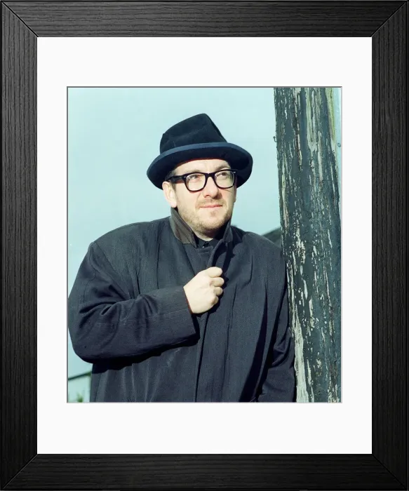 Framed Print : Elvis Costello singer outside local pub The Johnny Fox near Dublin in the Irish Republic Framed Print : Elvis Costello singer outside local pub The Johnny Fox near Dublin in the Irish Republic