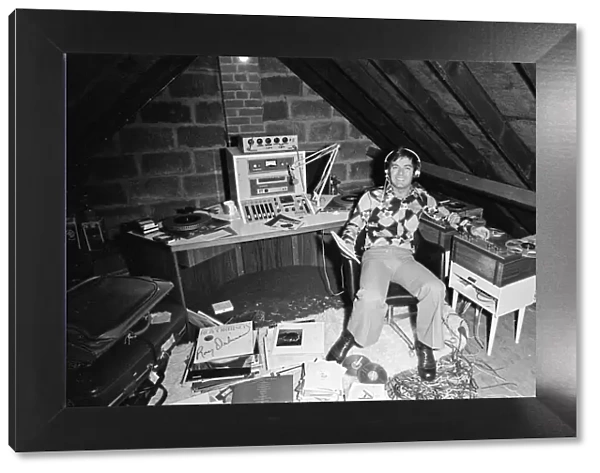 Tony Blackburn at home in Cookham Dean, Berkshire. Tony is pictured in the loft above his