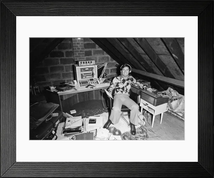 Framed Print : Tony Blackburn at home in Cookham Dean, Berkshire. Tony is pictured in the loft above his