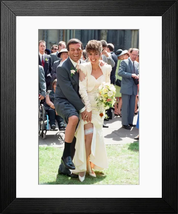Framed Print : The wedding of Tony Blackburn and Debbie Thomson held at St Margarets Church