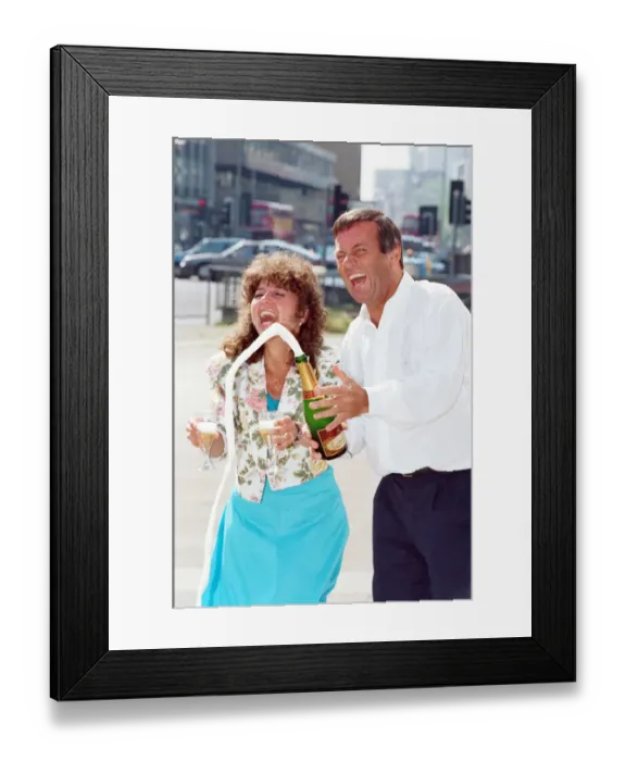 Framed Print : DJ Tony Blackburn and Debbie Thomson celebrate their engagement. 29th July 1991