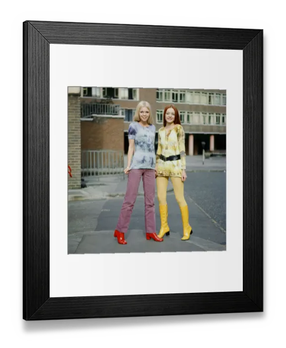 Framed Print : Tie-dye shirts worn by models, Jane (red hair) and Linda (blond hair). 3rd March 1970 Framed Print : Tie-dye shirts worn by models, Jane (red hair) and Linda (blond hair). 3rd March 1970