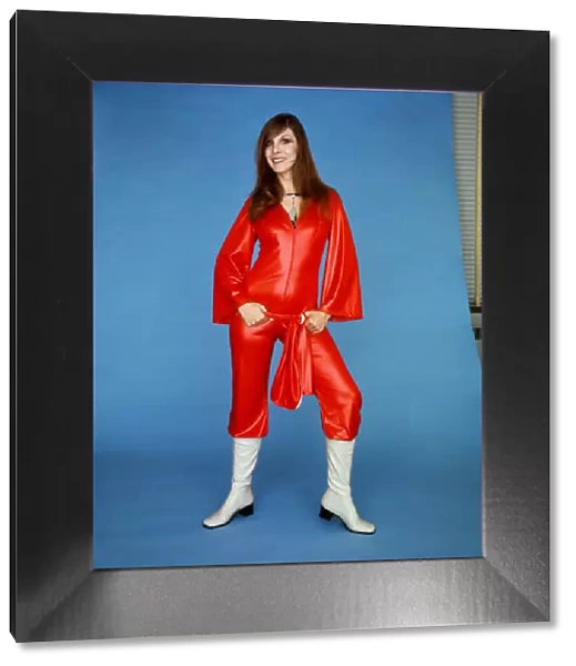A model wearing a scarlet catsuit in gleaming cire by House of Ailish, £9