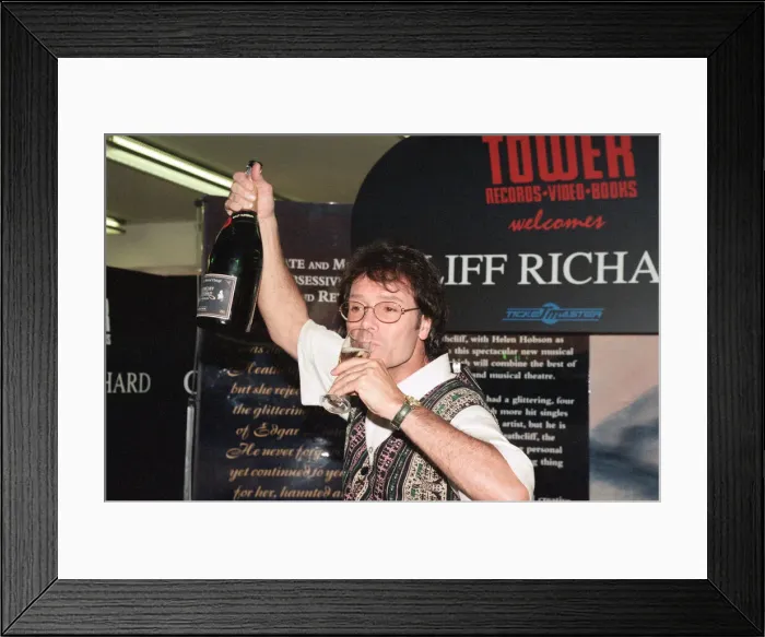 Framed Print : Sir Cliff Richard at Tower Records in Londons Piccadilly Circus Framed Print : Sir Cliff Richard at Tower Records in Londons Piccadilly Circus