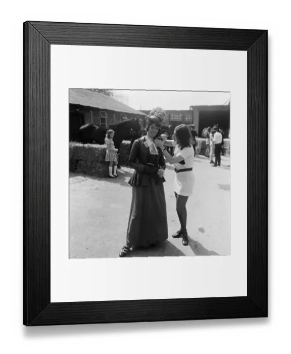 Framed Print : Make-up girl Hilary Steinberg puts finishing touches to Susan Strank