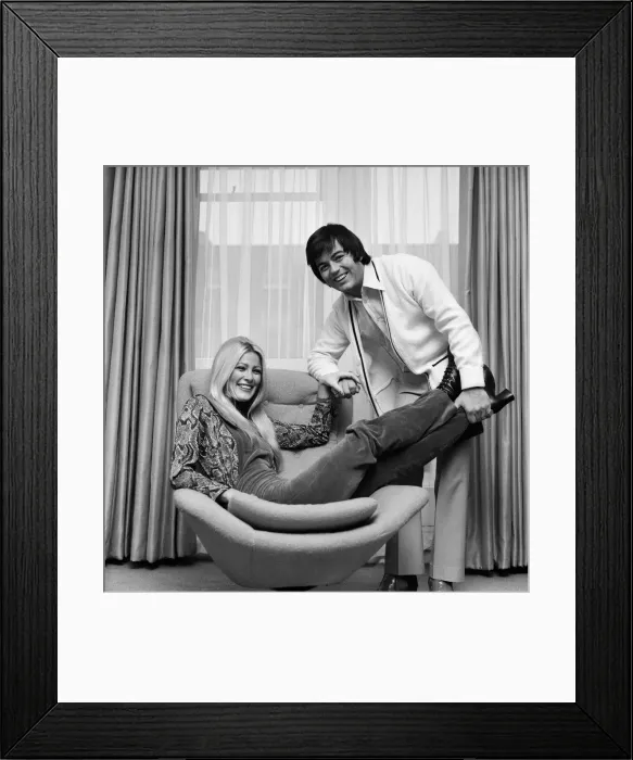 Framed Print : Tony Blackburn with his girlfriend Lynn Partington photographed in his Regents Park flat Framed Print : Tony Blackburn with his girlfriend Lynn Partington photographed in his Regents Park flat