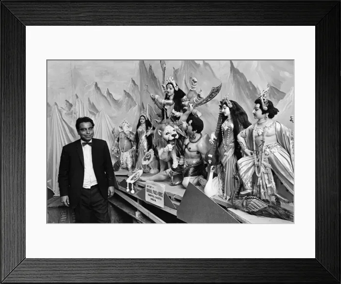 Framed Print : Mr Gupta with Indian statues. 13th October 1969 Framed Print : Mr Gupta with Indian statues. 13th October 1969