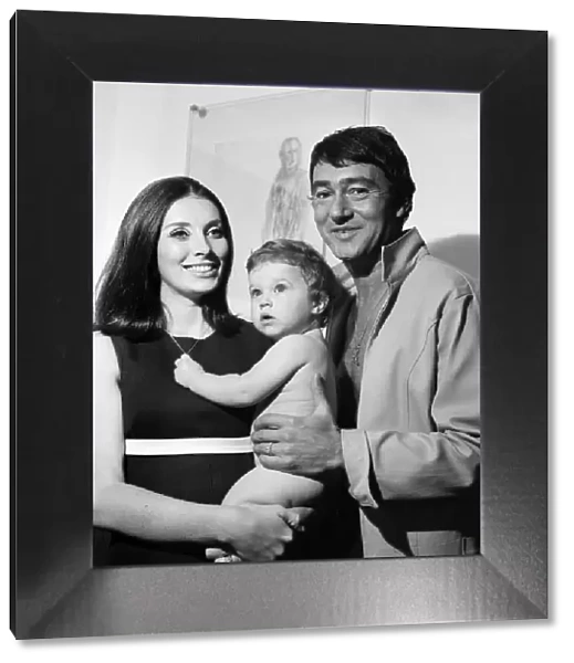 Hairstylist Vidal Sassoon, his wife Beverly and their one year old daughter Catya