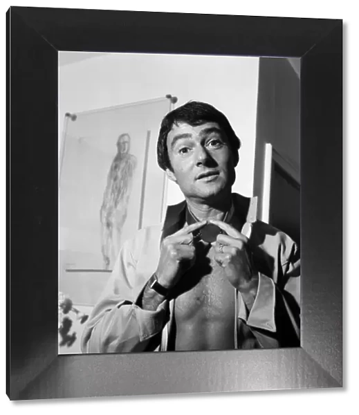 Hairstylist Vidal Sassoon, pictured in his flat. 27th August 1969