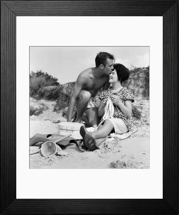 Framed Print : Pop singer Marty Wilde and his 19-year-old wife Joyce on the beach at Shell Bay, Dorset Framed Print : Pop singer Marty Wilde and his 19-year-old wife Joyce on the beach at Shell Bay, Dorset