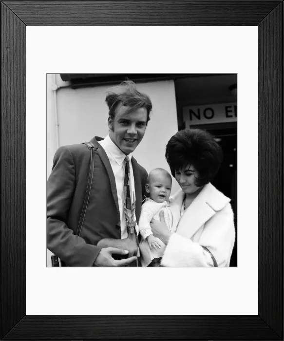 Framed Print : Marty Wilde at London Airport with his wife Joyce and their six month old daughter Kim Framed Print : Marty Wilde at London Airport with his wife Joyce and their six month old daughter Kim