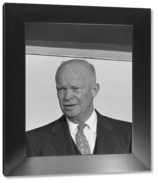 US President Eisenhower seen here on the dais at Heathrow Airport as he is officially