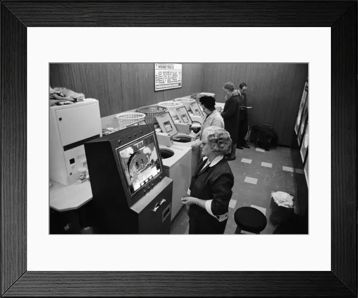 Framed Print : A gambling machine has been installed in the launderette in the Warwick Road, Banbury Framed Print : A gambling machine has been installed in the launderette in the Warwick Road, Banbury