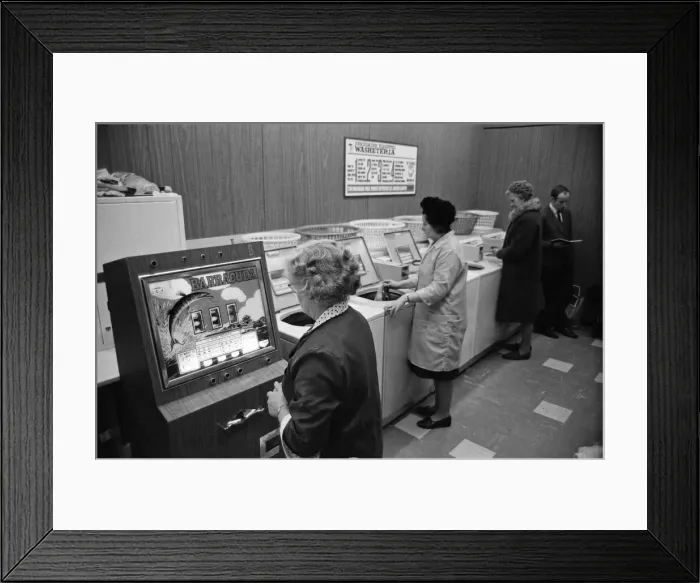 Framed Print : A gambling machine has been installed in the launderette in the Warwick Road, Banbury Framed Print : A gambling machine has been installed in the launderette in the Warwick Road, Banbury