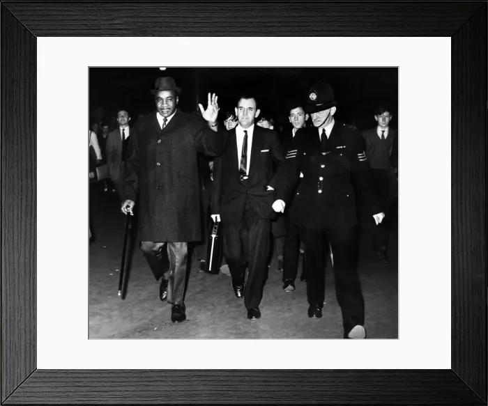 Framed Print : Sonny Liston at Newcastle Central Station with Mr Leslie Roberts Framed Print : Sonny Liston at Newcastle Central Station with Mr Leslie Roberts