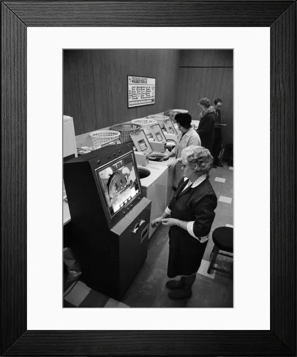 Framed Print : A gambling machine has been installed in the launderette in the Warwick Road, Banbury Framed Print : A gambling machine has been installed in the launderette in the Warwick Road, Banbury