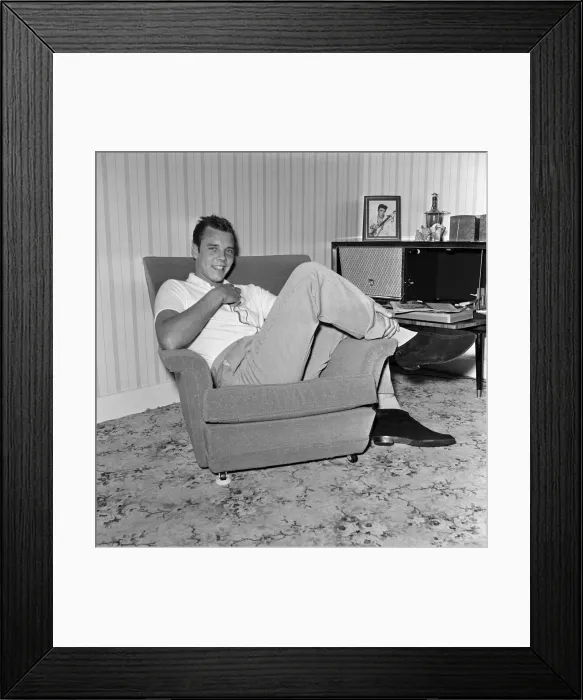Framed Print : Marty Wilde at home in his flat in Chiswick, London. 21st April 1960 Framed Print : Marty Wilde at home in his flat in Chiswick, London. 21st April 1960