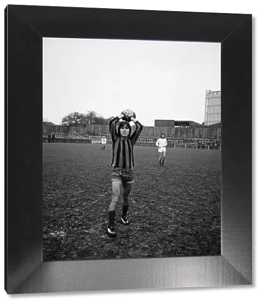 Cliff Richard playing football at a charity football match at Southall. 1st January 1973