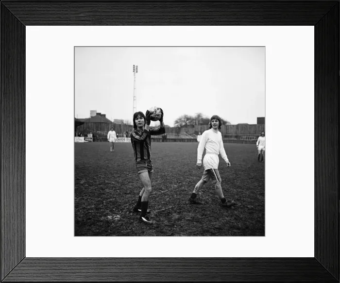 Framed Print : Cliff Richard playing football at a charity football match at Southall. 1st January 1973 Framed Print : Cliff Richard playing football at a charity football match at Southall. 1st January 1973