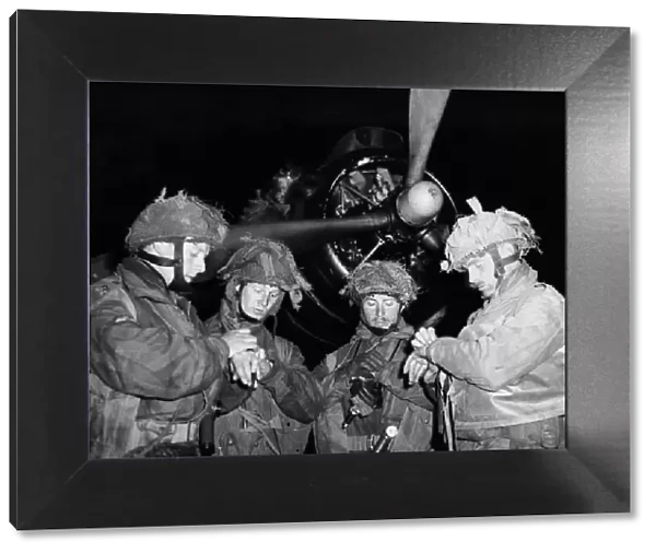 Liberation of Europe. Picture shows: These four officers set their watches before