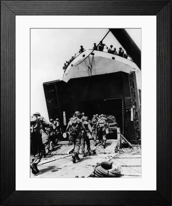 Framed Print : Members of a combat engineer unit march abroad an LST at an English port Framed Print : Members of a combat engineer unit march abroad an LST at an English port