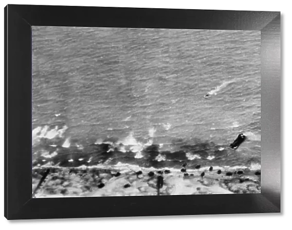 An aerial view of the storming of Beach Head in the great allied attack on the French