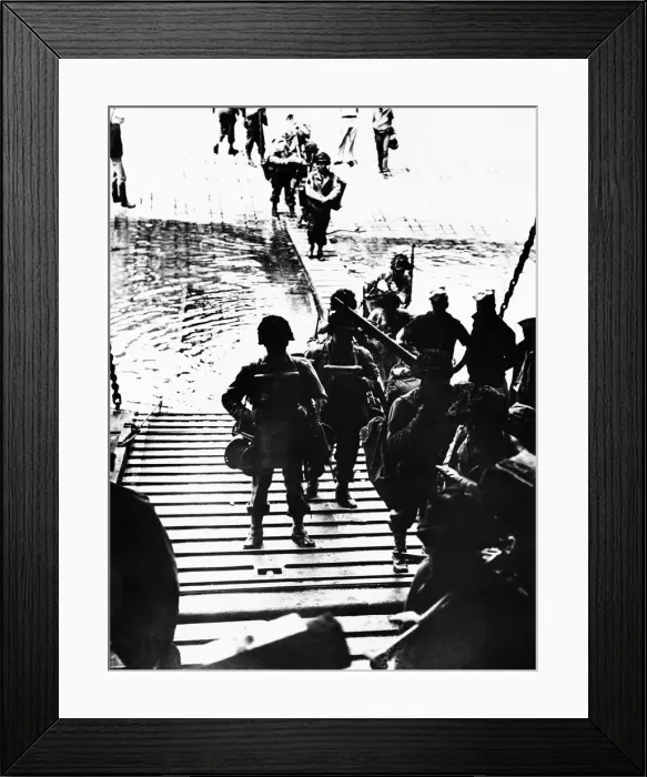 Framed Print : GI.s (with equipment) entering landing craft during WWII. 6th June 1944 Framed Print : GI.s (with equipment) entering landing craft during WWII. 6th June 1944