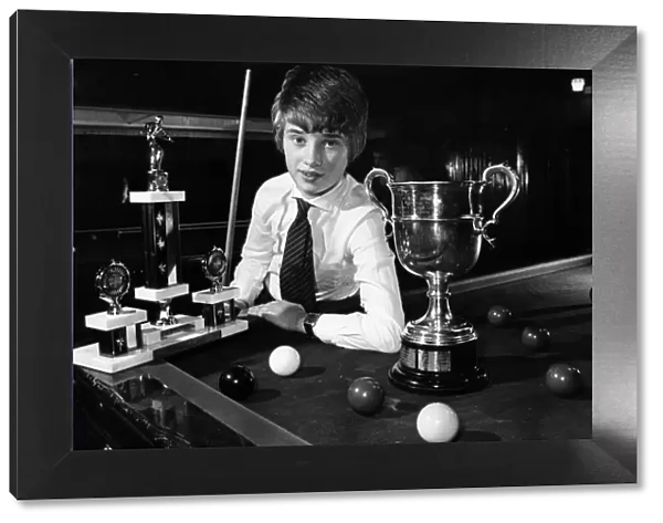 A young Stephen Hendry poses with some of his trophies shortly after becoming the first