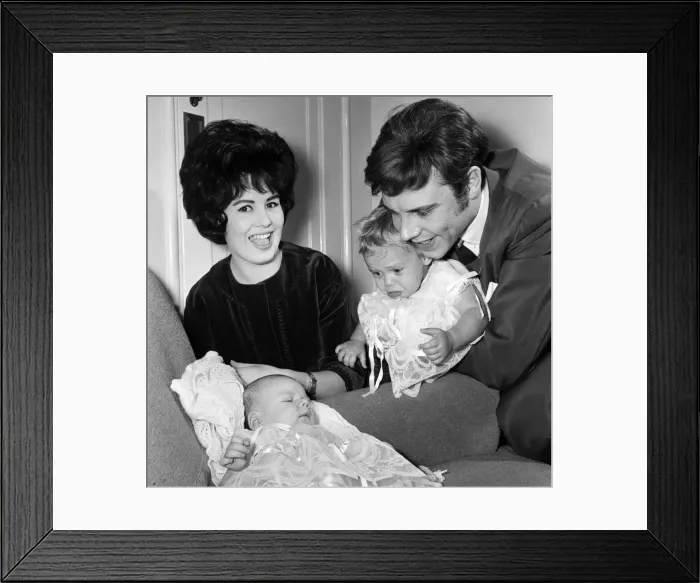 Framed Print : Singer Marty Wilde and his wife Joyce at home in Chiswick after the christening of their Framed Print : Singer Marty Wilde and his wife Joyce at home in Chiswick after the christening of their