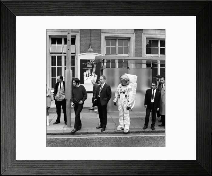 Framed Print : Spaceman in London streets. Jonathan Bosley, dressed in a space man suit as used by Framed Print : Spaceman in London streets. Jonathan Bosley, dressed in a space man suit as used by