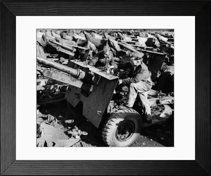 Framed Print : Made at an equipment depot somewhere in England a 25 pounder gun receiving coat of paint Framed Print : Made at an equipment depot somewhere in England a 25 pounder gun receiving coat of paint