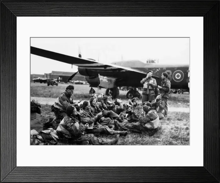 Framed Print : Paratroops sitting with their kits ready for emplaning, they have a Union Jack which will Framed Print : Paratroops sitting with their kits ready for emplaning, they have a Union Jack which will