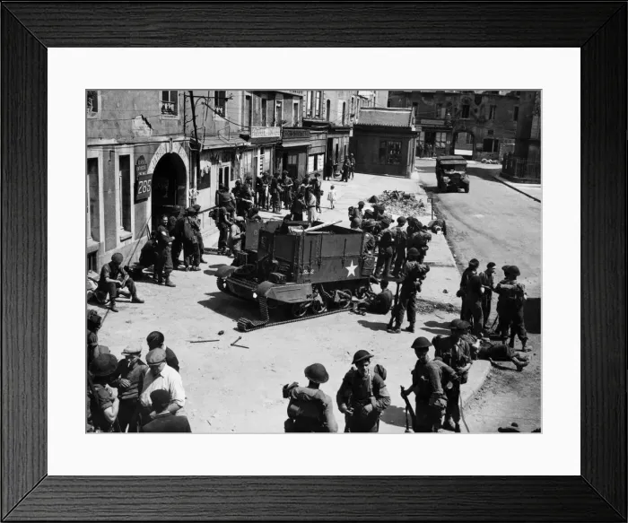Framed Print : Liberation of Europe British troop sin Normandy. A street scene in Douvers
