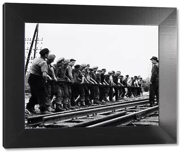 Liberation of Europe: British Sappers and French railmen repair damaged Normandy railway