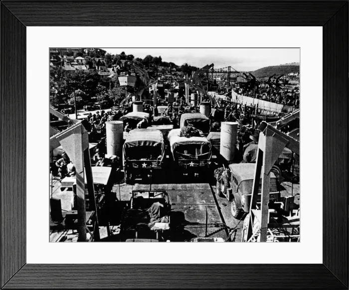 Framed Print : American vehicles loaded aboard landing ships in the river Dart during preparations for