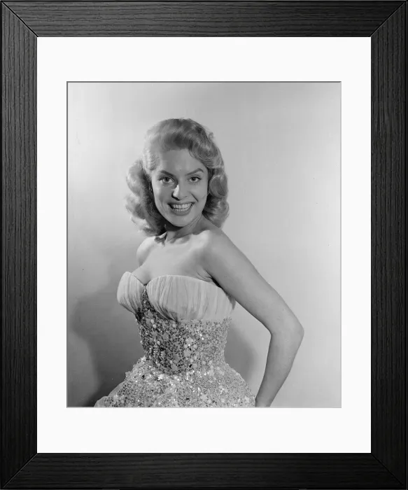 Framed Print : Belinda Lee, British actress tries on dress designed by Julie Harris Framed Print : Belinda Lee, British actress tries on dress designed by Julie Harris