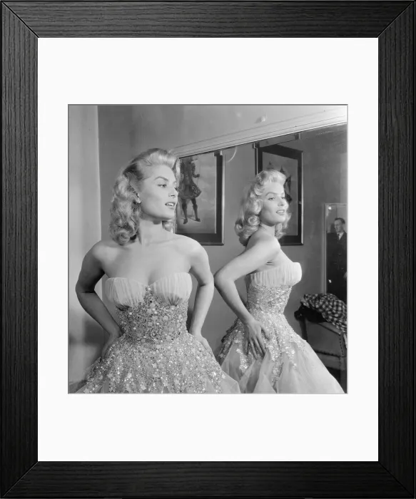 Framed Print : Belinda Lee, British actress tries on dress designed by Julie Harris Framed Print : Belinda Lee, British actress tries on dress designed by Julie Harris