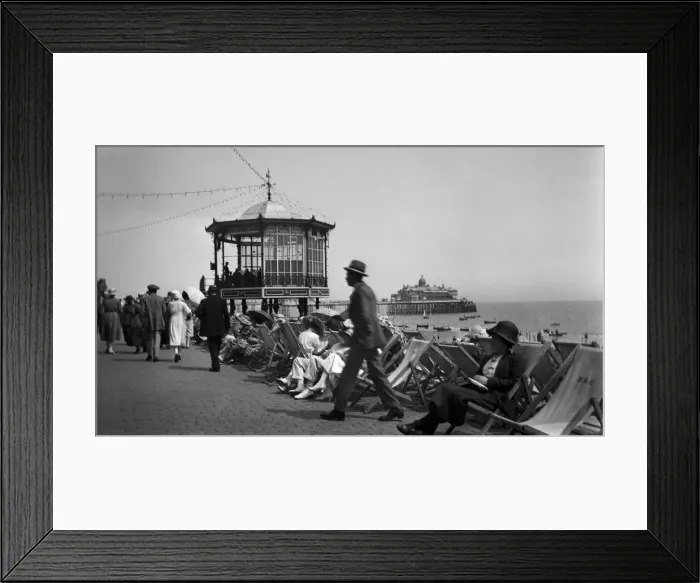 Framed Print : People on the seafront at Eastbourne, East Sussex, 1921. Tyrell Collection Framed Print : People on the seafront at Eastbourne, East Sussex, 1921. Tyrell Collection