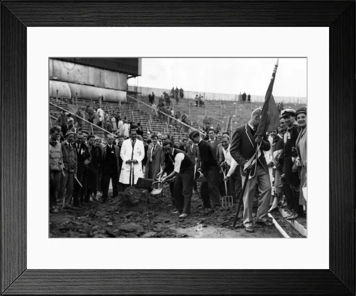 Framed Print : 1958 British Empire and Commonwealth Games - workmen digging up the track at Cardiff Arms Framed Print : 1958 British Empire and Commonwealth Games - workmen digging up the track at Cardiff Arms